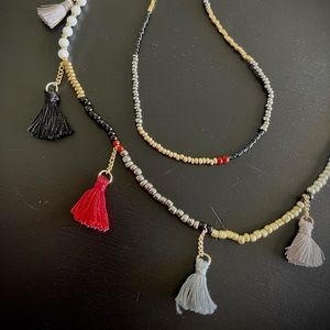 Bead necklace with tassels